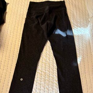 lululemon charcoal grey high waisted leggings with pockets, size six